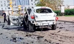 A destroyed car and debris at the site of a car bomb attack that killed a worker with the Russian-controlled Zaporizhzhia nuclear power plant in Enerhodar, Ukraine