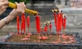 Guangzhou, China ‘Locals flock to the temples around Guangdong province over Dragon Boat Festival, which honours the poet Qu Yuan.’