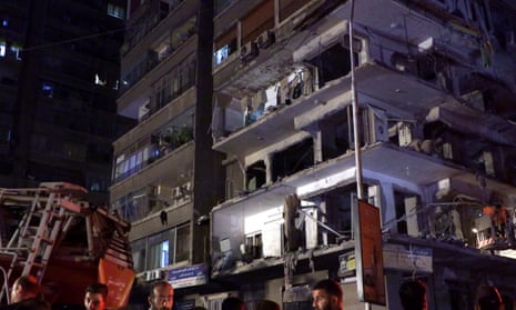 Casualties, debris after airstrike hits residential building in Damascus