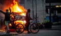 A police car is set on fire by far-right activists in Sunderland on 2 August 2024