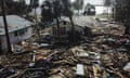 Debris surrounds the Faraway Inn cottages and motel in the aftermath of Hurricane Helene in Florida.