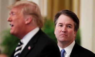 FILE PHOTO: U.S. President Donald Trump speaks next to U.S. Supreme Court Associate Justice Brett Kavanaugh as they participate in a ceremonial public swearing-in in the East Room of the White House in Washington, U.S., October 8, 2018. REUTERS/Jim Bourg/File Photo