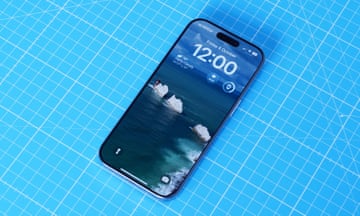 Apple iPhone 16 Pro review showing the lockscreen on a blue mat.