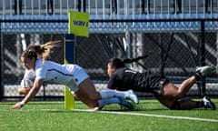 England's Jess Breach scores one of her three tries against New Zealand.