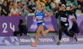 Italy's Valentina Petrillo (left) during the women's T12 400m semi-final at the Paris Paralympics.