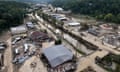 an aerial view of damaged homes