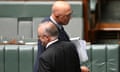 Australian Prime Minister Anthony Albanese walks past Australian Opposition Leader Peter Dutton