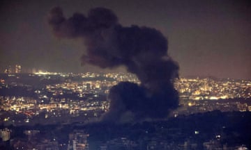 Smoke billows over Beirut southern suburbs.