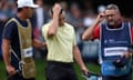 Rory McIlroy is consoled by his caddie after losing the playoff to Billy Horschel.