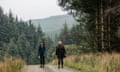 Helen Thomson and her friend Jess Bond walk in Kielderhead national nature reserve.