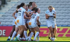 Exeter’s Liv McGoverne and her teammates celebrate scoring the winning points from a late penalty against Harlequins.