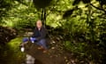 Alistair Boxall, professor in environmental science at the University of York, taking a water sample at Brook Head Beck